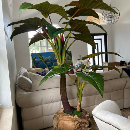Largealer artificial plant in bowl